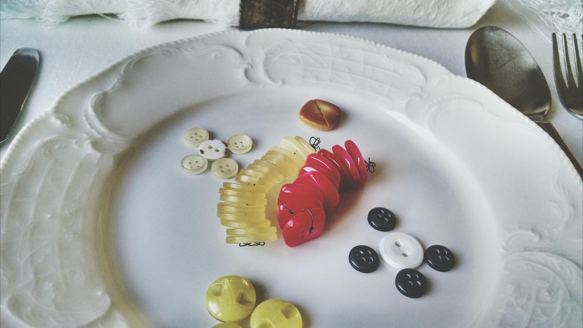 Assorted plated courses on a serving board